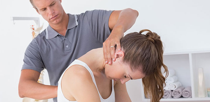 Woman receiving chiropractic adjustment from a Sandpoint chiropractor