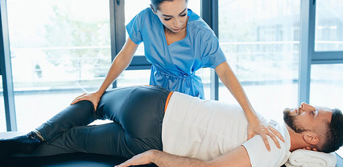 Patient receiving sciatica treatment from Sandpoint chiropractor