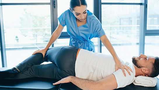 Patient receiving sciatica treatment from Sandpoint chiropractor